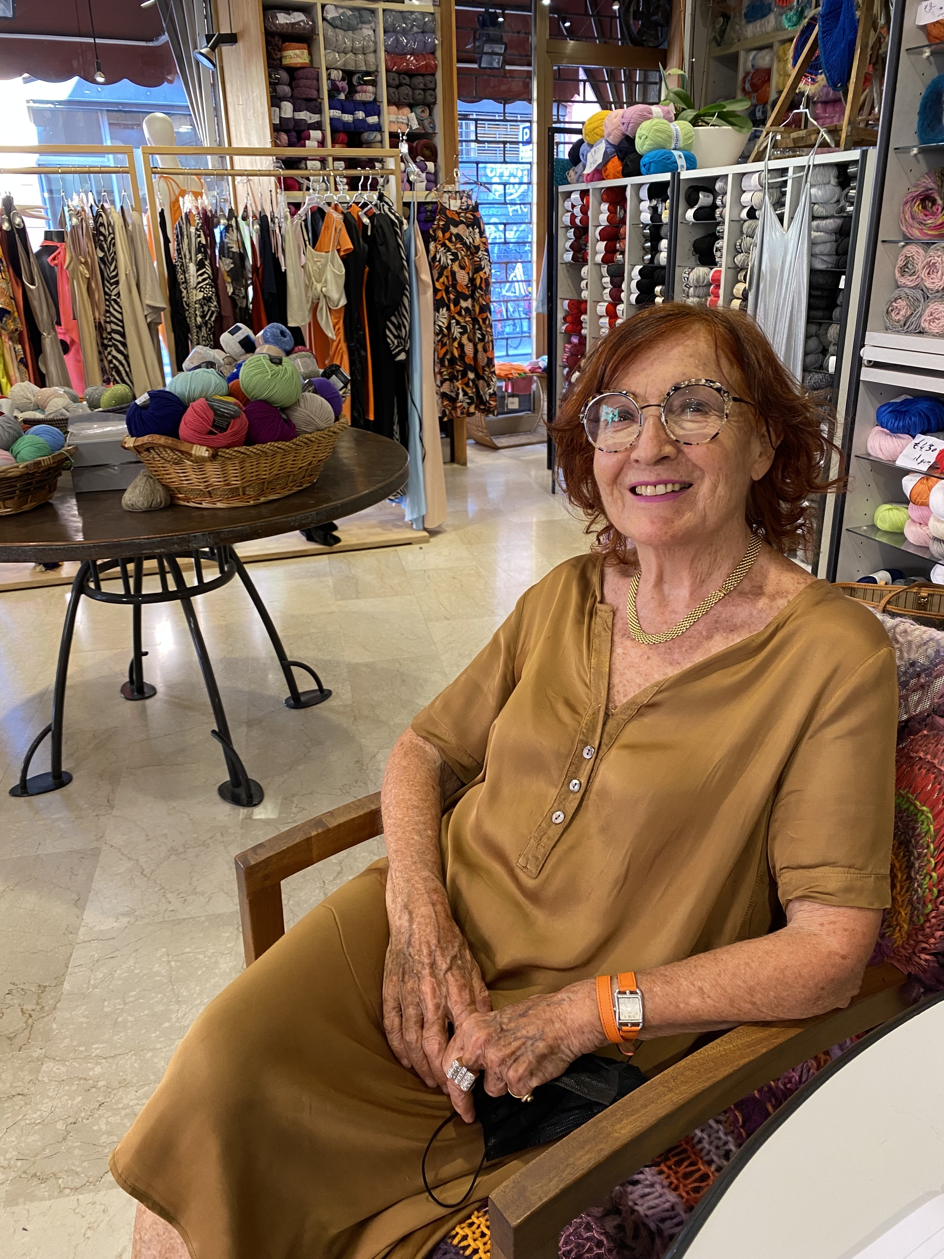 Aurora's grandmother in her wool shop, Casa della Lana, in Bologna